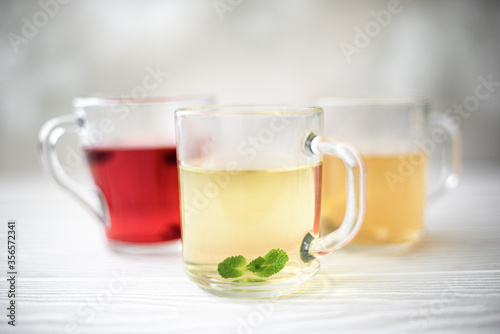 herbal tea and hibiscus tea in glass mugs