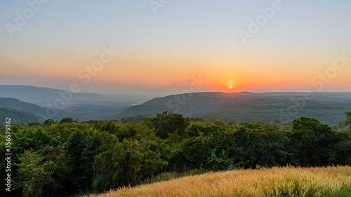 landscape of mountains valley during the sunset. Natural outdoor background concept © bigy9950