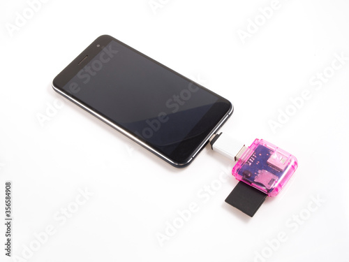 mobile phone with otg equipment for transfer data from sd card photo