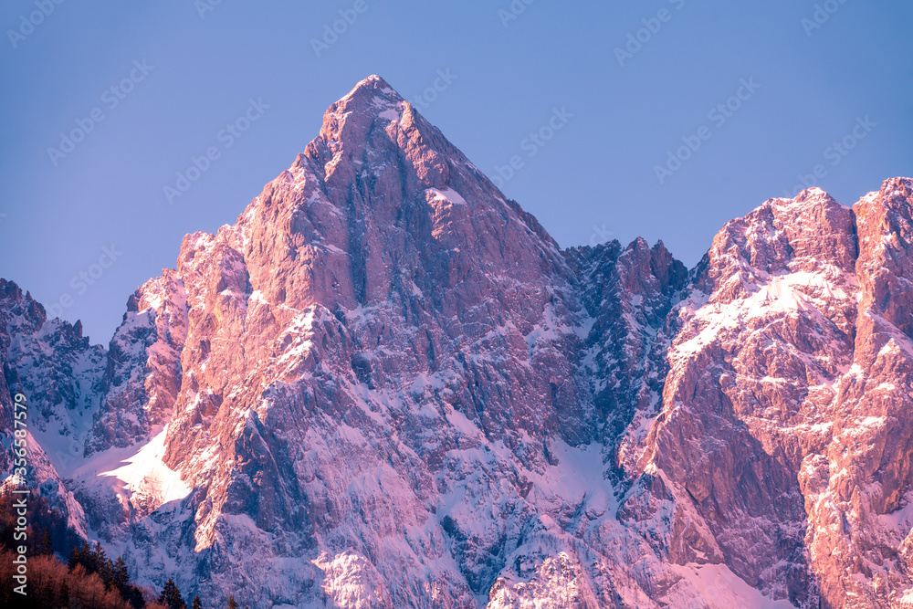 View of Alps in Kranjska Gora at sunrise. The tops of the mountains are covered with snow. Triglav national park. Slovenia, Europe