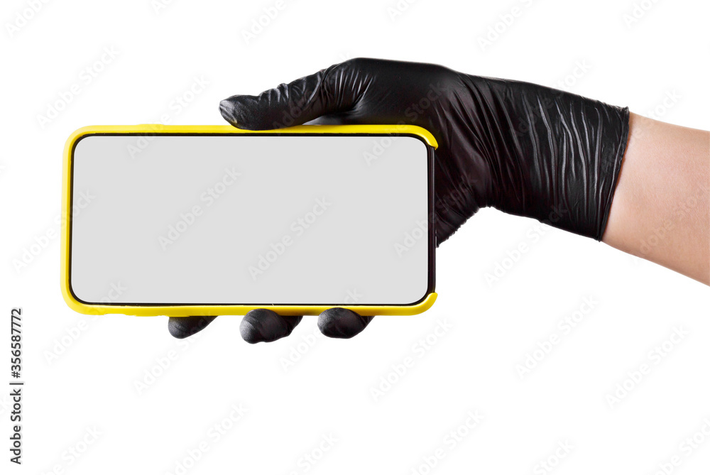 Hand in black glove holding mobile phone with blank screen isolated on white Hand in black glove holding mobile phone with blank screen isolated on white