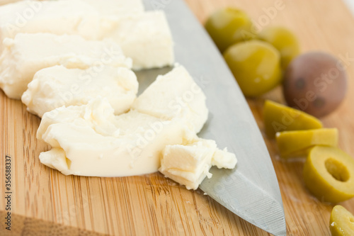 feta cheese with chopped olives photo