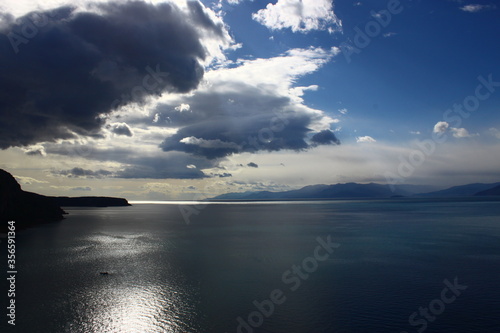 A sky full of clouds over the sea