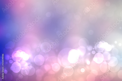 Abstract gradient purple pink blue background texture with blurred bokeh circles and lights. Space for design. Beautiful backdrop.