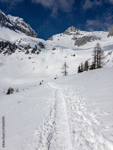 Panoramic winter view of the Poncione di Cassina Baggio from the Piansecco hut in the Bedretto valley in Switzerland.