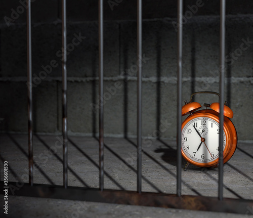 Fotografia retro red alarm clock at about 7 o'clock on jail or prisoner room time restrict concept