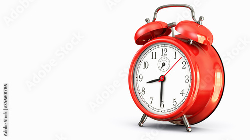 retro red alarm clock at eight and thirty o'clock on white background