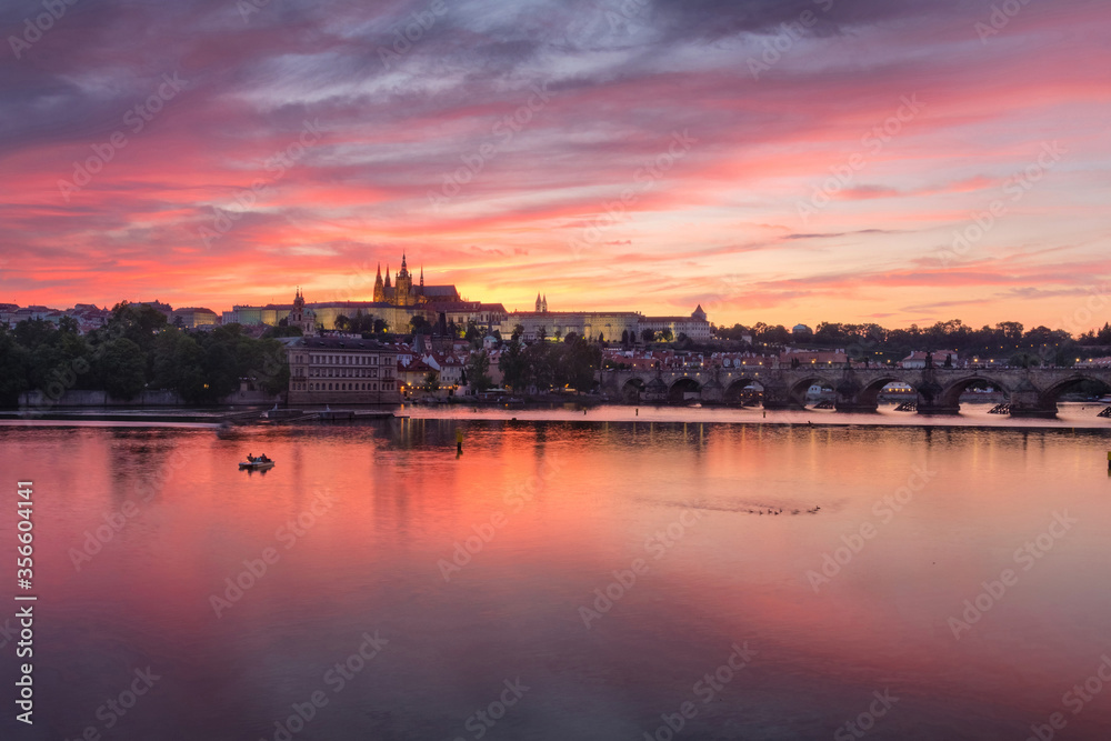 Purple view on Prague Castle with Charles Bridge after the sunset