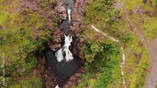 Aerial drone view of flying above Kondwal Waterfall, Maharashtra, India. photo