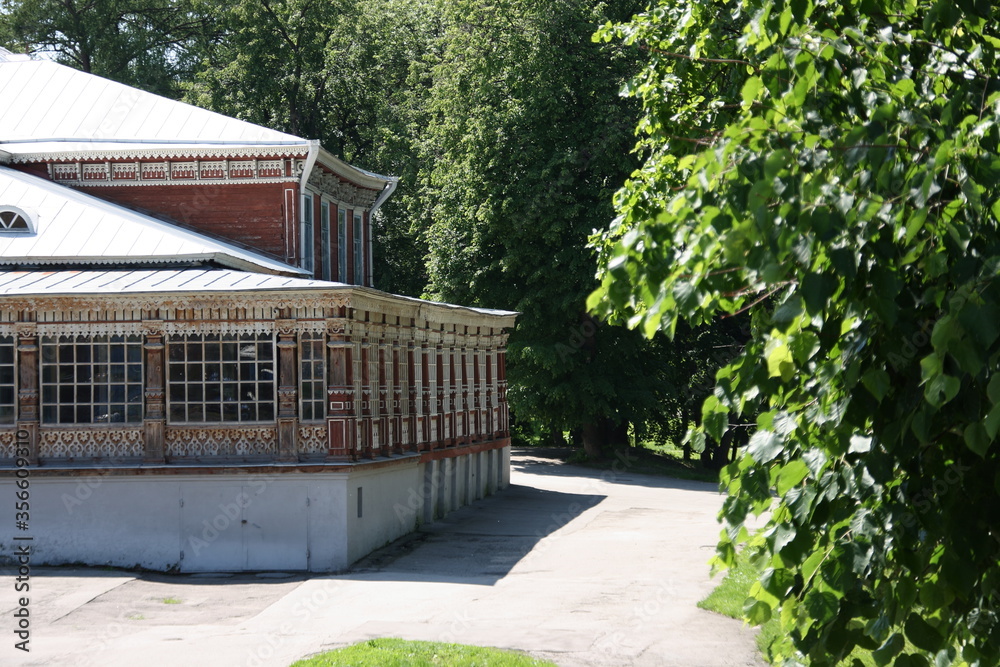 A wooden building with beautiful carvings in the city park of the city of Ryazan. Built in 1905 A wooden building with beautiful carvings in the city park of the city of Ryazan. Built in 1905