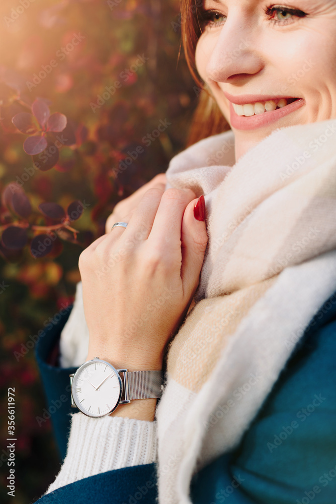 beautiful fashionable young girl in the Park in autumn in Sunny weather beautiful fashionable young girl in the Park in autumn in Sunny weather