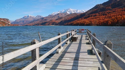 Wallpaper Mural Amazing autumn view of Sils lake. Larch trees on the hills in Swiss Alps. First snow covered the high mountain ranges. Autumn landscape os Switzerland, Europe. Full HD video (High Definition).
 Torontodigital.ca