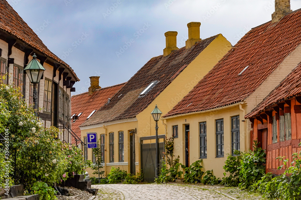 Ebeltoft, Denmark Quaint cobblestoned streets in the old town. Ebeltoft, Denmark Quaint cobblestoned streets in the old town.