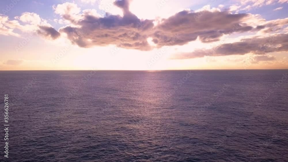 Beautiful cinematic ocean sunrise and sunset on a quiet sea Beautiful cinematic ocean sunrise and sunset on a quiet sea