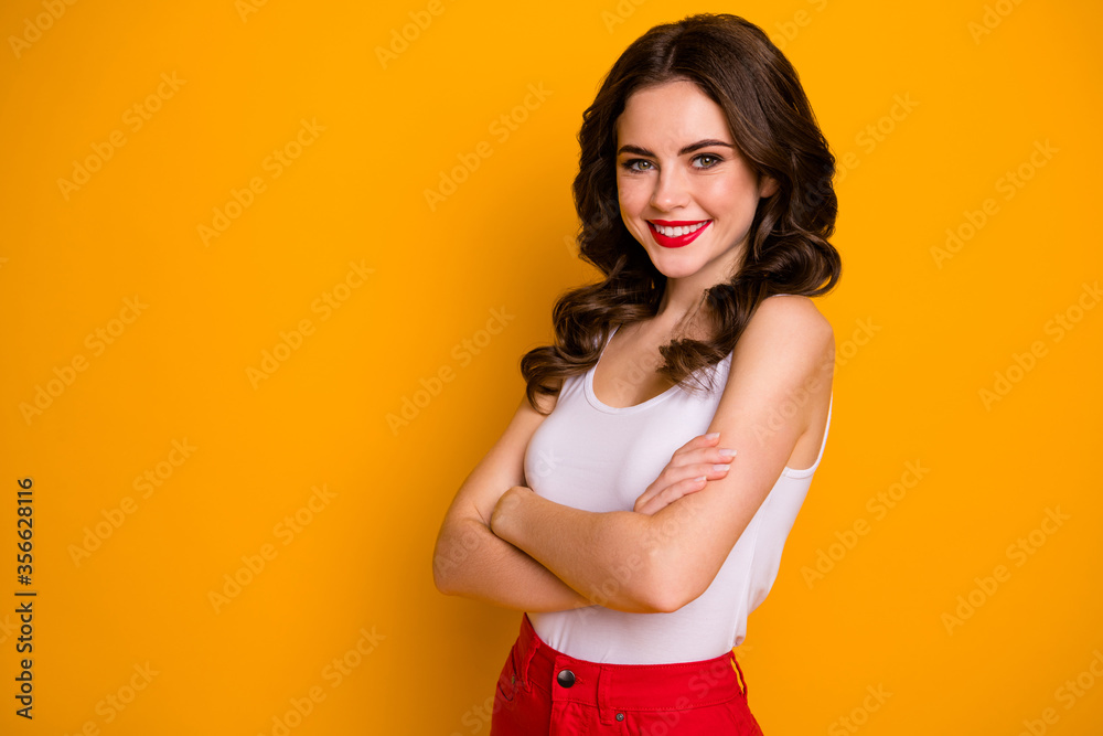 Profile photo of pretty cheerful lady arms crossed self-confident business woman responsible friendly person wear casual white tank-top red skirt isolated yellow color background Profile photo of pretty cheerful lady arms crossed self-confident business woman responsible friendly person wear casual white tank-top red skirt isolated yellow color background