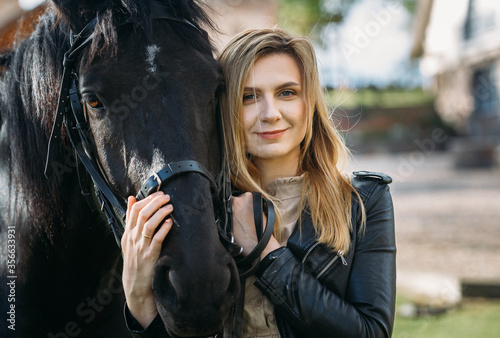 beautiful girl and a horse © Andrei Sasin