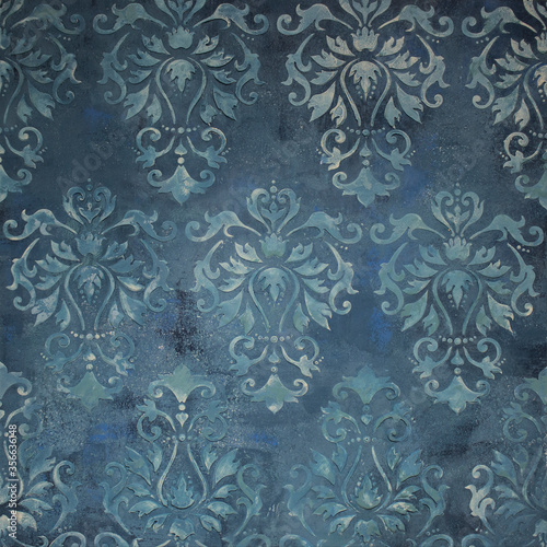 sample of factured plaster surface of the grey-turquoise-blue wall with floral ornament