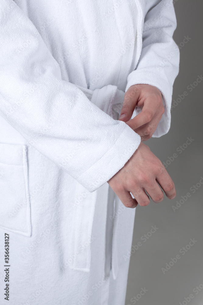 man in a white coat on a gray background man in a white coat on a gray background