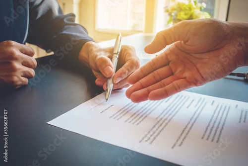 Signing a business contract, businessman agree to make deal signing business contract concept, agreement was signed  business. photo