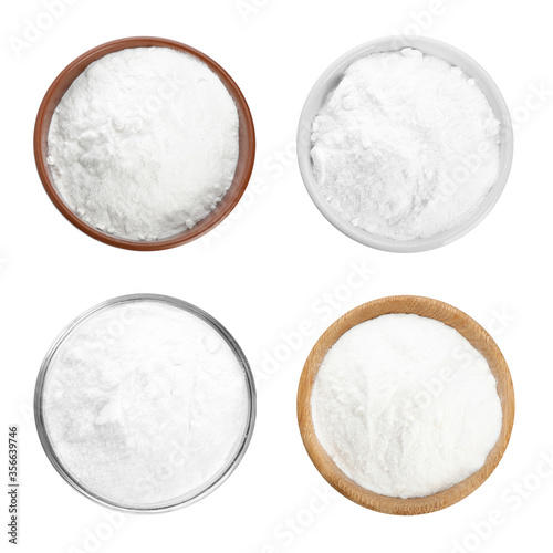 Set with bowls of baking soda on white background, top view