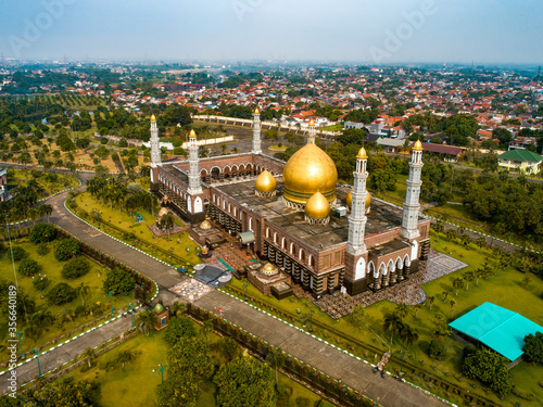 The golden mosque Indonesia drone shot Dian Al-Mahri Mosque photo