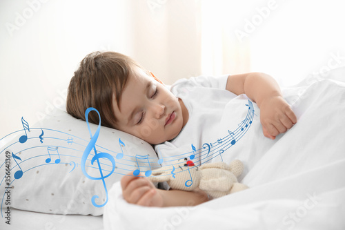 Obraz na płótnie Cute little baby sleeping with toy at home