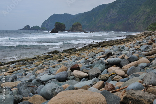 a fierce choppy beach on the south coast of Java, TANJUNGPAPUMA beach, located in the city of JEMBER, EAST JAVA, INDONESIA 