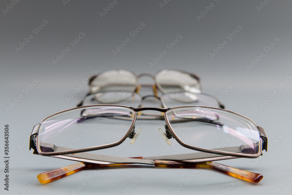 Prescription glasses isolated with grey background. Prescription glasses isolated with grey background.
