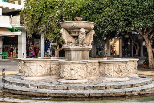 Morosini Fountain (also known  as Lions Square) in the center of  Heraklion city. Venetian fountain features four lions supporting the main dasin.