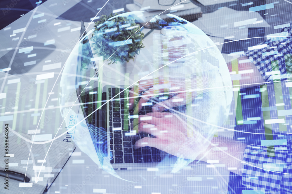 Double exposure of businessman working on laptop on background. International business hologram in front. Concept of success. Double exposure of businessman working on laptop on background. International business hologram in front. Concept of success.