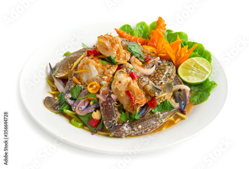 Spicy salad with blue crab Thai spicy food appetizer Thailand food goodtasty decorate with chili carved side view  isolated on white background