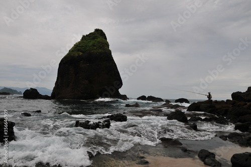 a fierce choppy beach on the south coast of Java, TANJUNGPAPUMA beach, located in the city of JEMBER, EAST JAVA, INDONESIA 