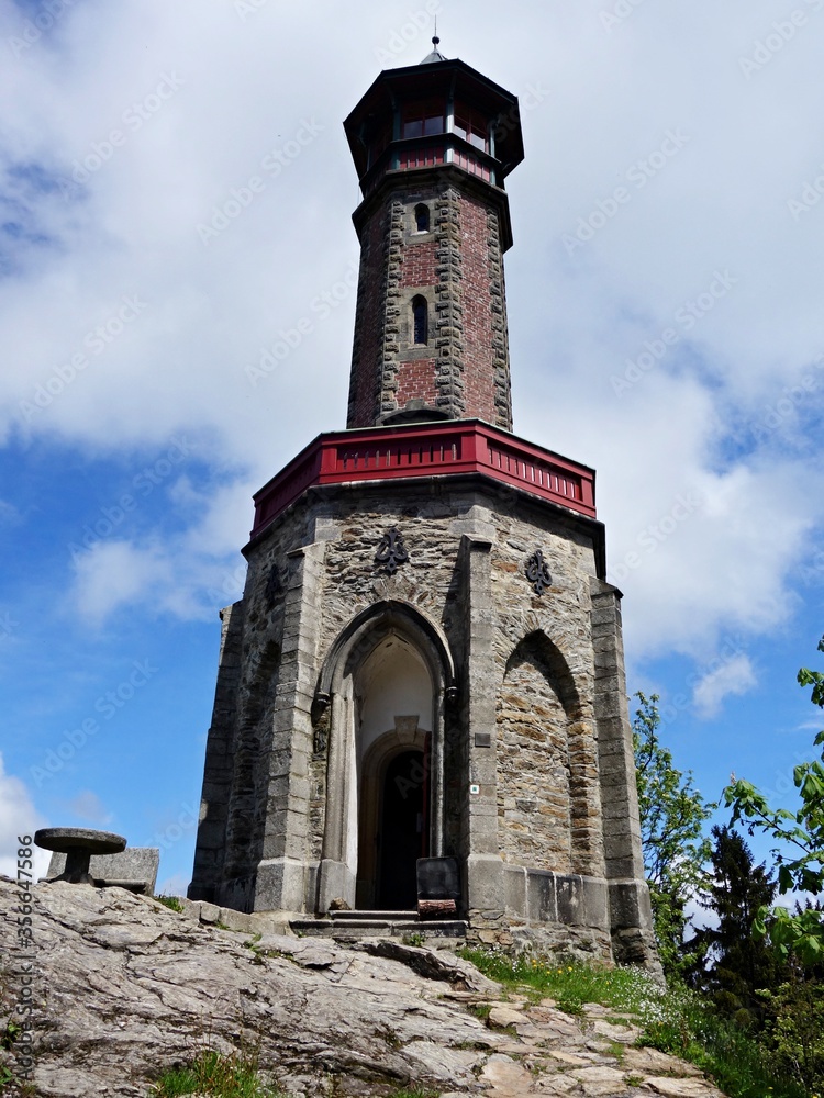 Stone neo-Gothic lookout tower Štěpánka on the hill Hvězda (959 m above sea level) on the Příchovice ridge - the oldest lookout tower in the Jizera Mountains.