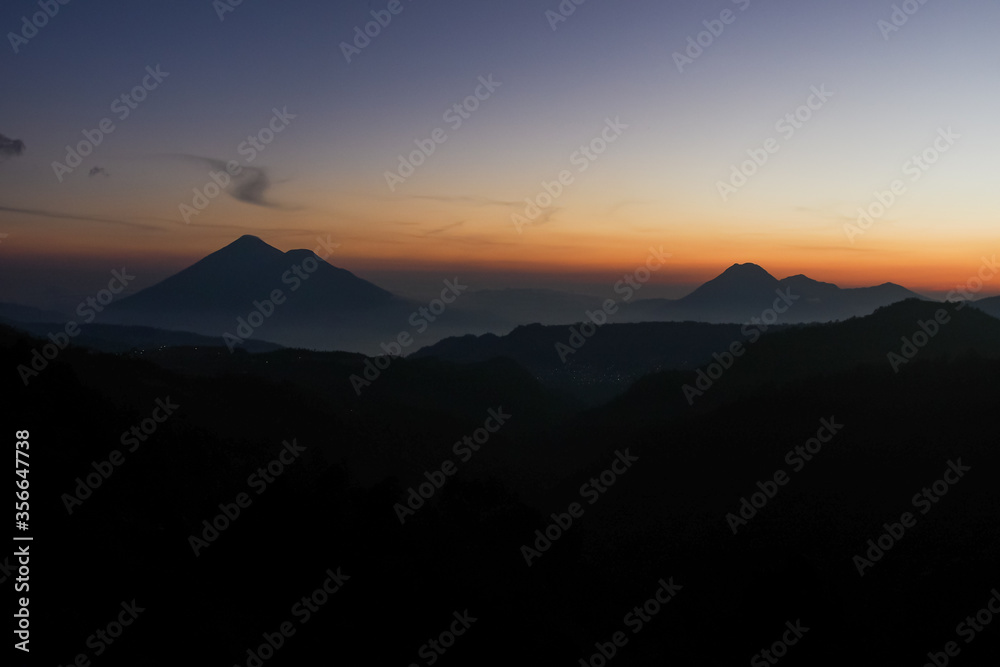 Colourful sunset with view over Guatemalan Volcanos