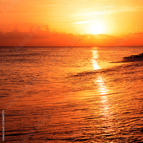 Sunset on the beach of caribbean sea.