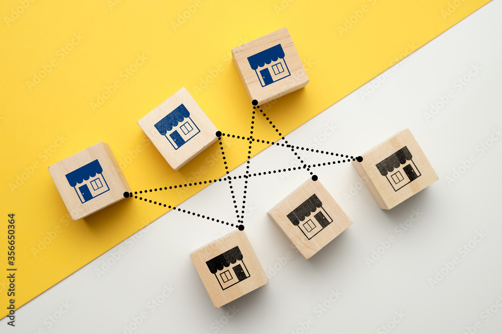 Φωτογραφία The concept of competition of stores in the market.