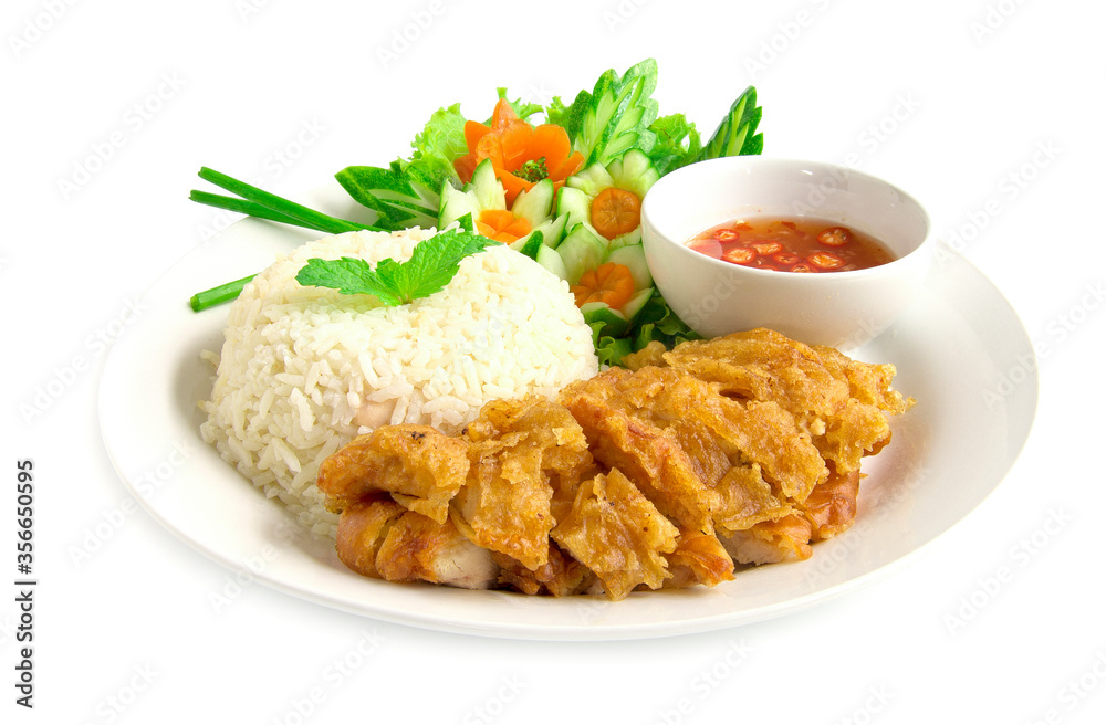 Hainanese crispy fried chicken rice with soya sauce Hainanese crispy fried chicken rice with soya sauce