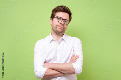 man looking in contempt, feeling loathing and disgust towards something