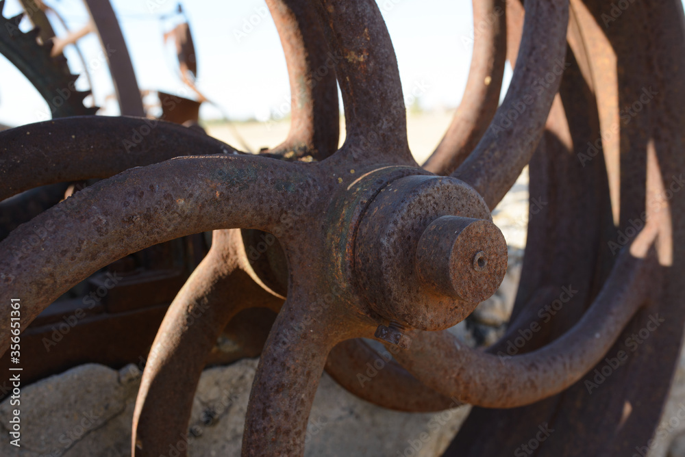 metallic and industrial gear in field metallic and industrial gear in field