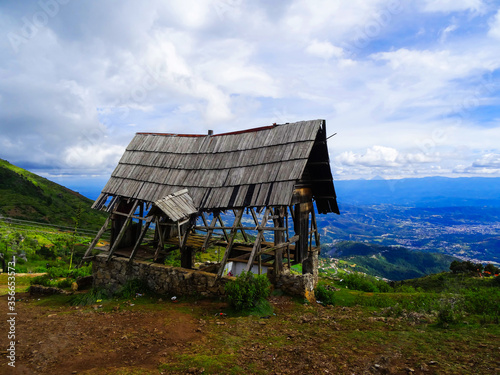 Small wooden hut in guatemalan mountains, Cuchumatanes, Guatemala photo