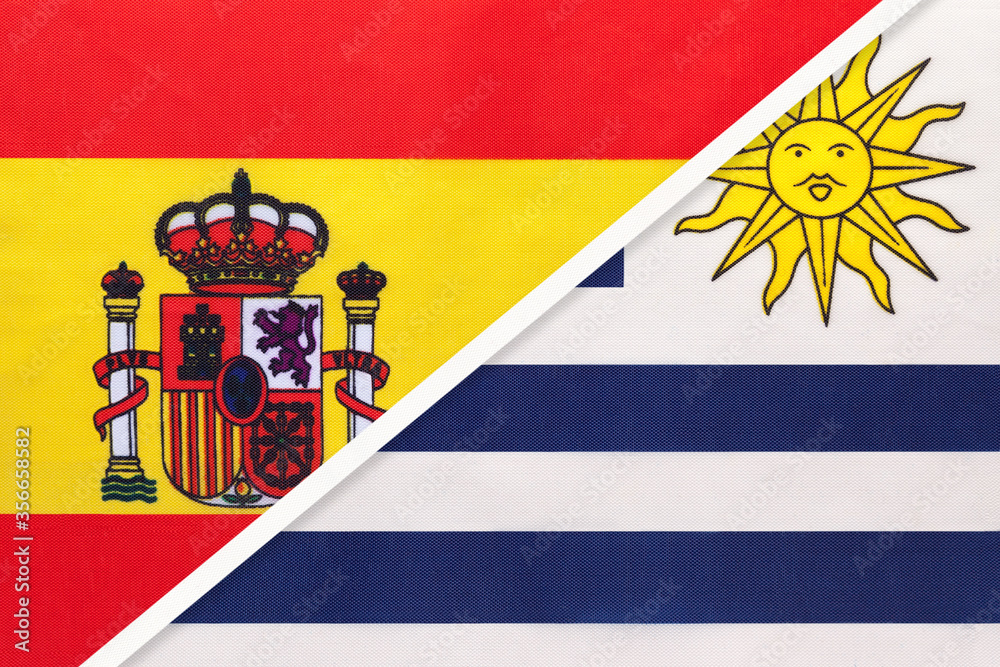 Spain and Uruguay, symbol of two national flags from textile. Partnership between European and American countries.