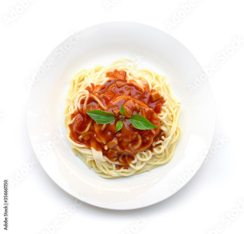Spaghetti Bolognese with tomato sauce and fresh basil