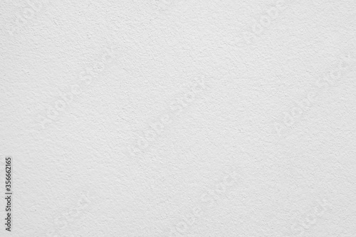 Surface texture of the clear white painted cement wall background.