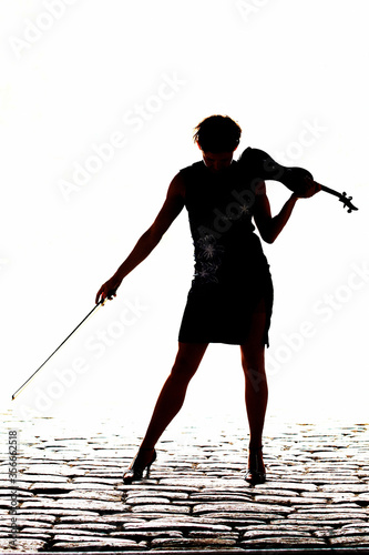 Silhouetted Female Vilolinist