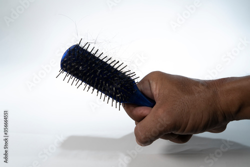 comb dirty with hair loss  isolated on a white background