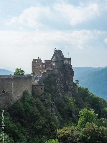 Ruins of castle Aggstein on a hill near Danube river on a cloudy day, Austria