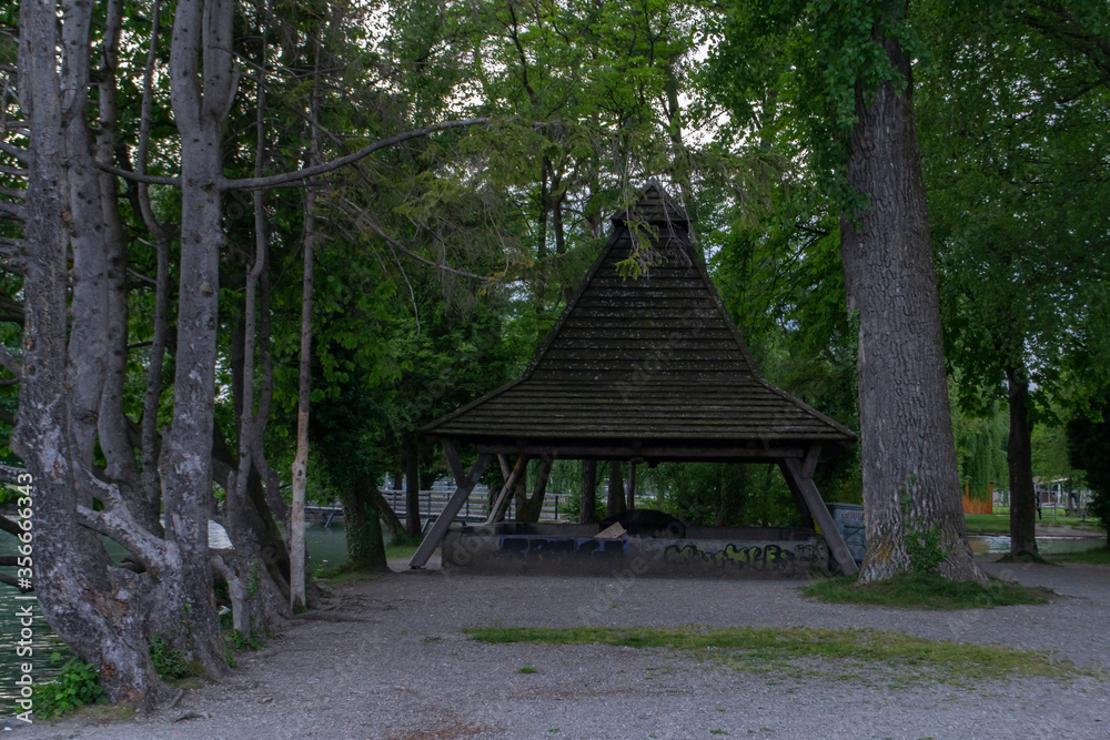wooden gazebo under the trees in Switzerland city of Thun wooden gazebo under the trees in Switzerland city of Thun