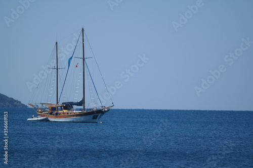 sailing boat on the sea © zozankeskin