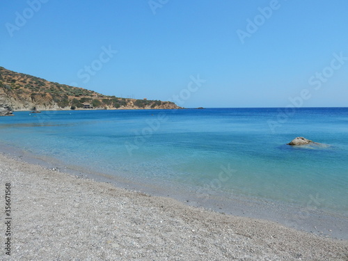 the tranquility and the crystal water of the paradisiac beach in Agios Nikolaos, Spoa, Karpathos, Greece