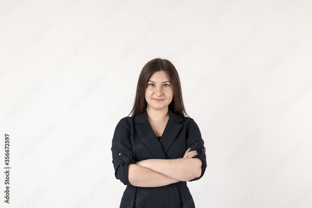 Young beautiful brunette woman smiling and looking at camera over bright background. Young beautiful brunette woman smiling and looking at camera over bright background.